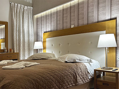 The luxurious bedroom of a Deluxe Apartment with the amazing COCO-MAT king-size bed