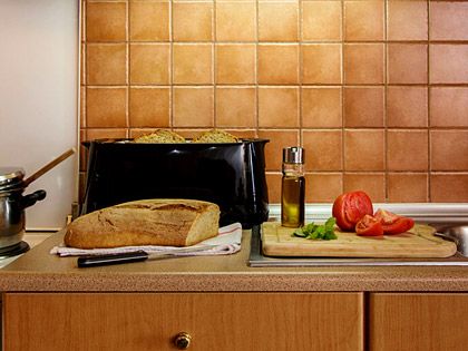 Taste authentic Cretan ingredients in the fully equipped Kitchen room of Annaview apartments & Suites