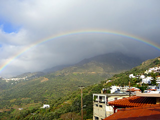 Winter Holidays in Crete - Amazing rainbow view from the apartments on a rainy Winter day